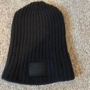 Love Your Melon beanie in black.